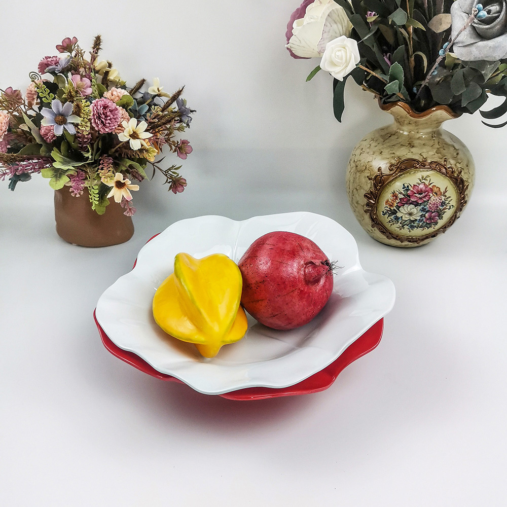 Ciotola di frutta per insalata di cibo occidentale con foglia di loto creativa ecologica